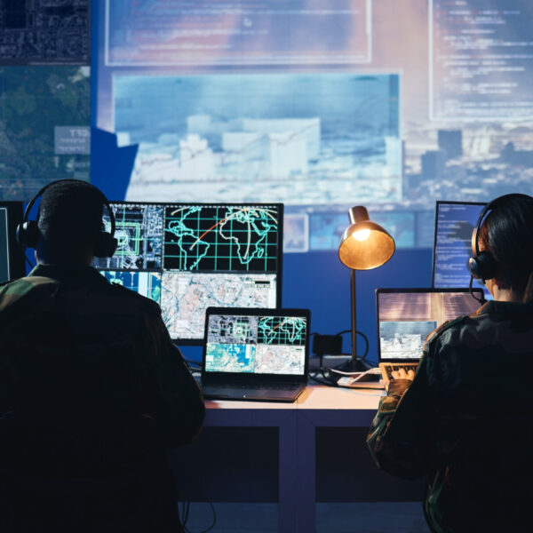 Military control room, computer screen and team with surveillance, headset and tech communication f.